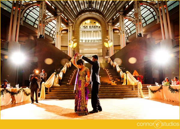 Jasmine and Gautam chose purple and orange for their wedding reception